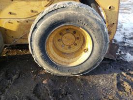 CAT 246 Right/Passenger Tire and Rim - Used | P/N 1859937