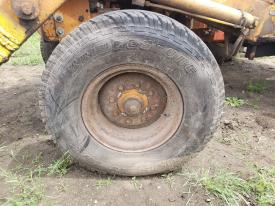 Case 580B Left/Driver Tire and Rim - Used