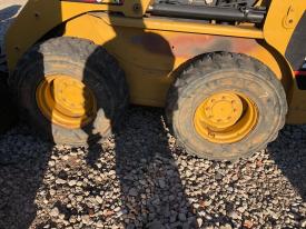 CAT 236 Left/Driver Tire and Rim - Used