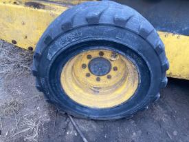 New Holland L185 Right/Passenger Tire and Rim - Used