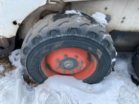 Bobcat S185 Right/Passenger Tire and Rim - Used