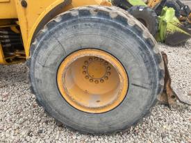 John Deere 644C Right/Passenger Tire and Rim - Used