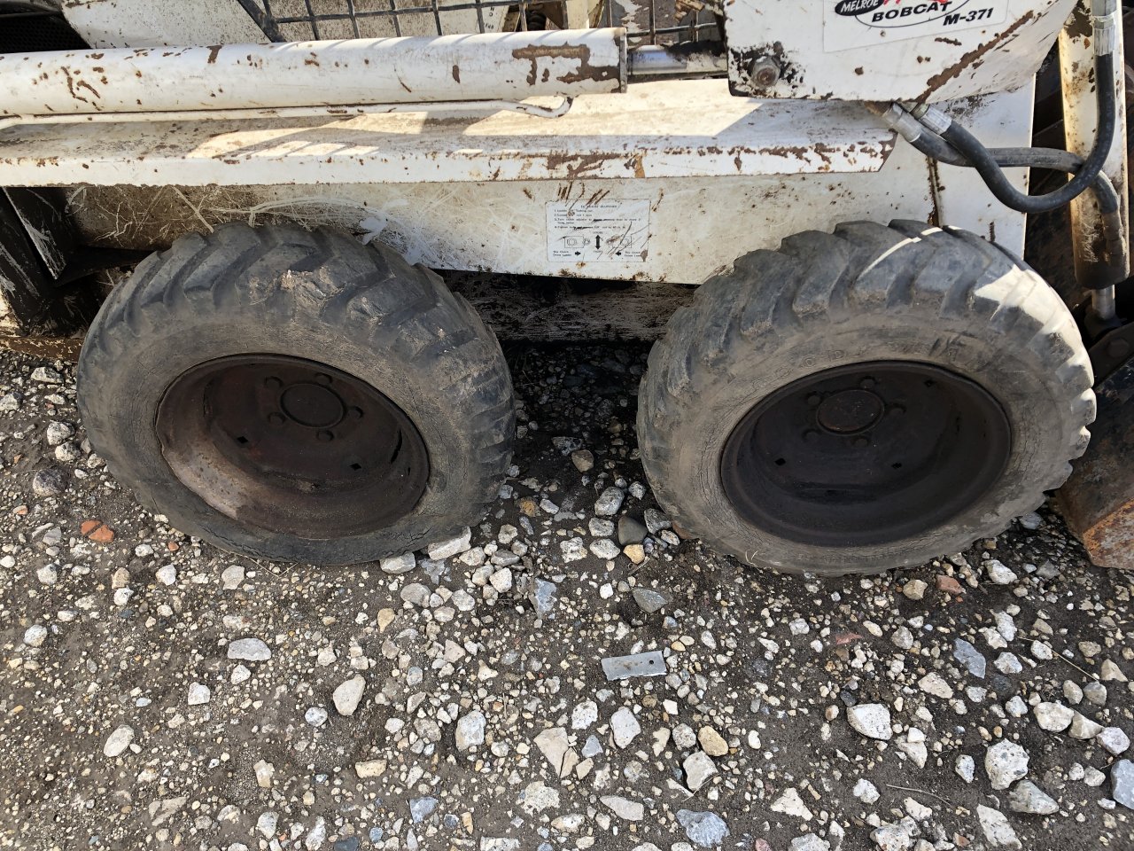 Bobcat M371 Tire and Rim