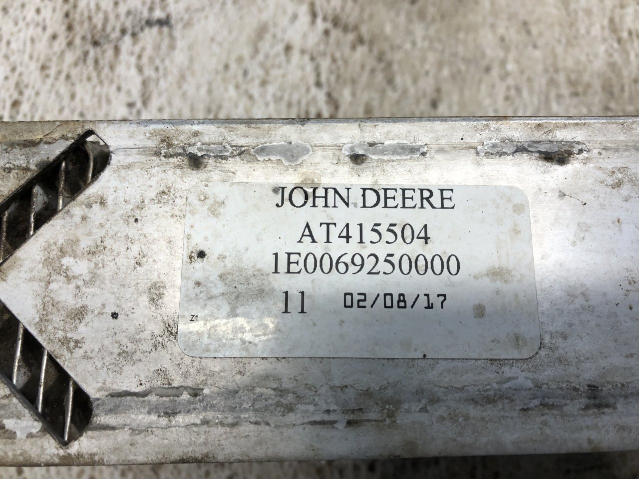 John Deere 318G Equip Charge Air Cooler - AT415504