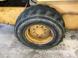 New Holland LX865 Right/Passenger Tire and Rim - Used