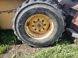 New Holland LX885 Right/Passenger Tire and Rim - Used