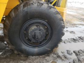 Michigan 75-AG Left/Driver Tire and Rim - Used