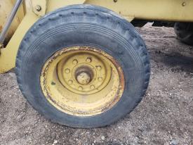 Case 680E Left/Driver Tire and Rim - Used