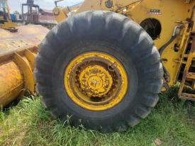 International H-90E Left/Driver Tire and Rim - Used