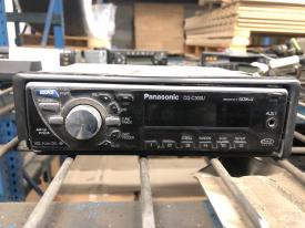Kenworth T2000 CD Player A/V Equipment (Radio), Aftermarket CD Player, W/ Wiring Harness, Plastic Trim Cracked On Bottom Left Coerner | P/N CQC300U