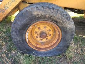 Case 580SK Left/Driver Tire and Rim - Used