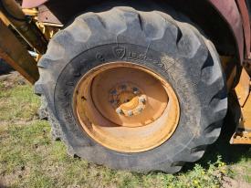 Case 580SK Right/Passenger Tire and Rim - Used