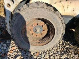 Bobcat S150 Left/Driver Tire and Rim - Used