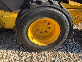 New Holland L175 Left Tire and Rim - Used | P/N 86590969