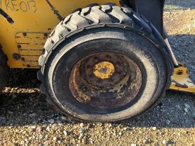 John Deere 320D Right/Passenger Tire and Rim - Used | P/N KV11921