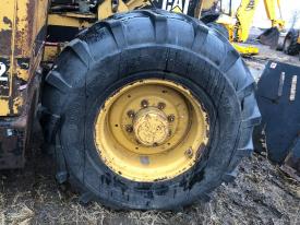 CAT TH62 Left Tire and Rim - Used