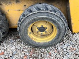 Gehl 4625SX Left/Driver Tire and Rim - Used