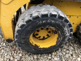 Gehl R220 Left/Driver Tire and Rim - Used