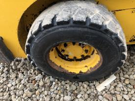 Gehl R220 Right/Passenger Tire and Rim - Used