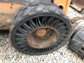 Case 60XT Tire and Rim