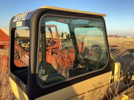 CAT TH63 Right/Passenger Back Glass - Used