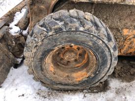 Case SV250 Left/Driver Tire and Rim - Used