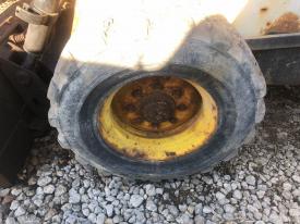 Bobcat 873 Left/Driver Tire and Rim - Used
