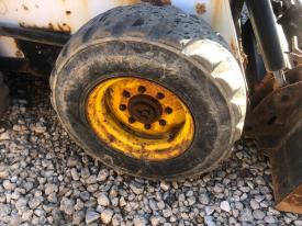 Bobcat 873 Right/Passenger Tire and Rim - Used
