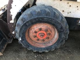 Bobcat 763 Left/Driver Tire and Rim - Used