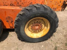 John Deere 670A Left/Driver Tire and Rim - Used
