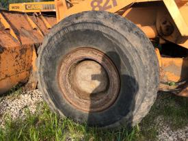 Case 821 Left/Driver Tire and Rim - Used