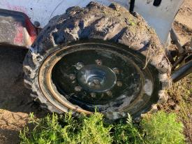 Bobcat S770 Right/Passenger Tire and Rim - Used