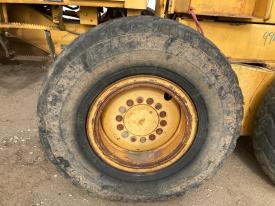 John Deere 770CH Left/Driver Tire and Rim - Used