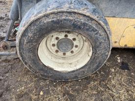 New Holland L228 Left/Driver Tire and Rim - Used