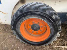 Bobcat 751 Right/Passenger Tire and Rim - Used