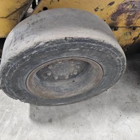 John Deere 240 Left/Driver Tire and Rim - Used