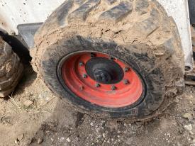 Bobcat S740 Right/Passenger Tire and Rim - Used