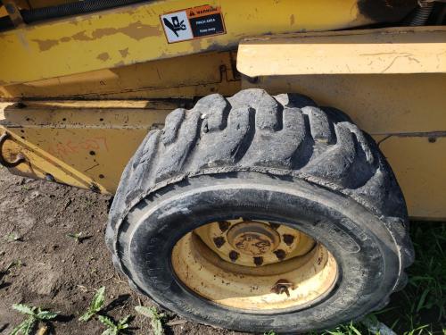 1995 New Holland LX885 Right Tire And Rim