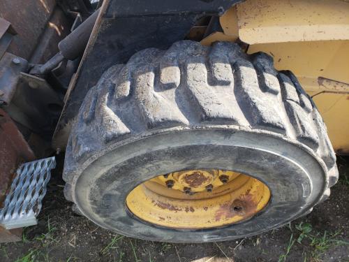 1995 New Holland LX885 Left Tire And Rim