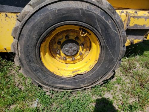 2005 New Holland LS185B Left Tire And Rim