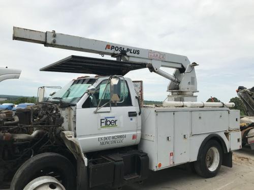 Utilitybody | Length: 11.5' | 11.5' Baker Service Body W/ Non Functional, Posi Plus 800-40-010 Hoist, Does Not Include Slewing Motor, Headache Rack Is Bent, Shows Minor Rust, Impact To Boom, Rear Bumper Bent