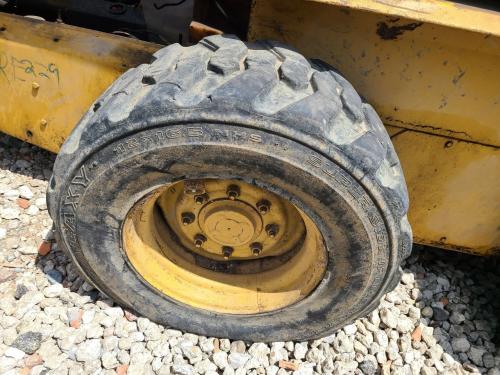 1999 New Holland LX885 Right Tire And Rim
