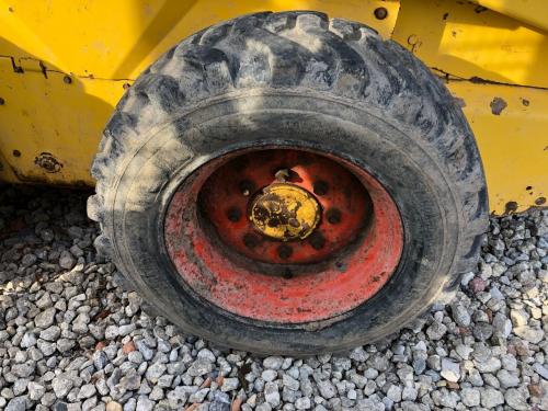 2003 New Holland LS170 Left Tire And Rim