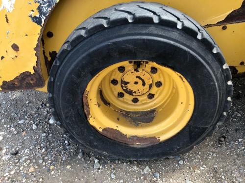 2001 Cat 226B3 Right Tire And Rim
