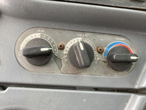 2005 International CE Heater & AC Temp Control: 3 Knobs: Air Circulation, Driver/ Passenger Side Heat, Temperature Control; Peeling