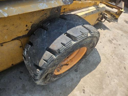 1997 New Holland LX865 Left Tire And Rim