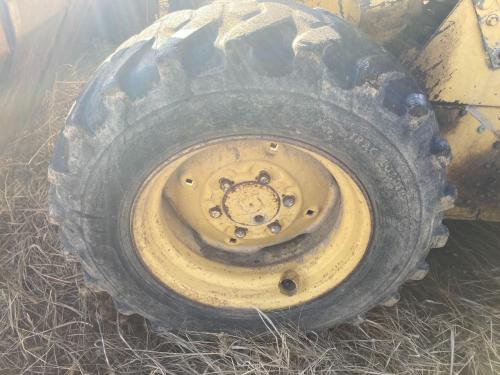 1987 New Holland L553 Left Tire And Rim